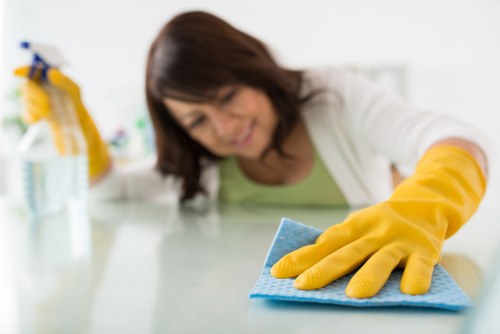 Technician wearing PPE during a West Heath carpet cleaning job